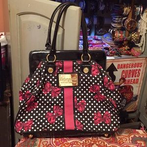 Betseyville Deep pink and polka dot shoulder bag.